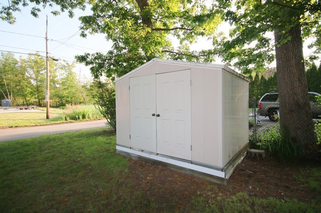 1 Bisson Lane Merrimac, MA 01860 - Photo 27 of 30 a backyard of a house with lots of green space