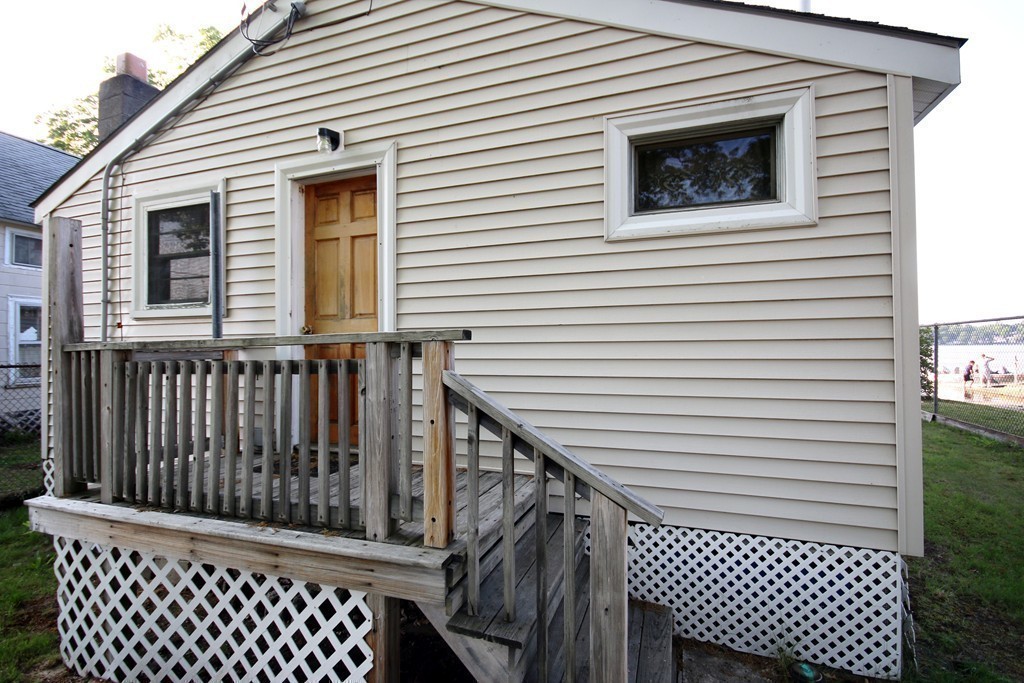 1 Bisson Lane Merrimac, MA 01860 - Photo 30 of 30 a view of a house with wooden deck
