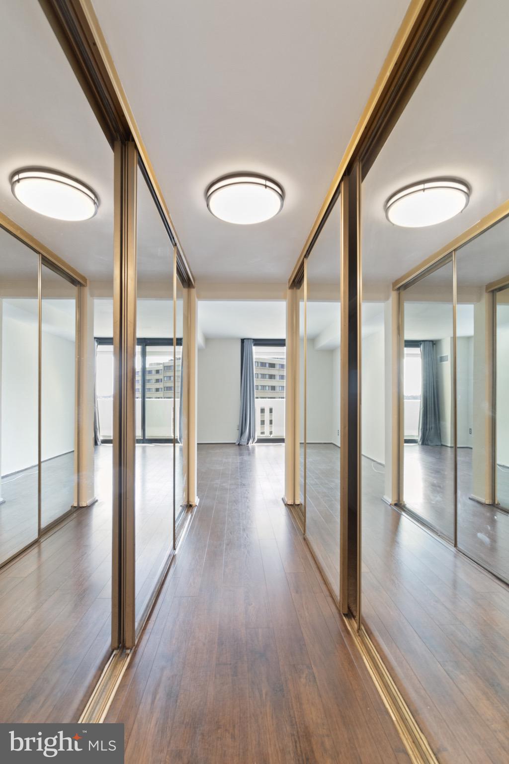 6101 Edsall Road, Unit 1209 Alexandria, VA 22304 - Photo 20 of 35 a view of a hallway with wooden floor