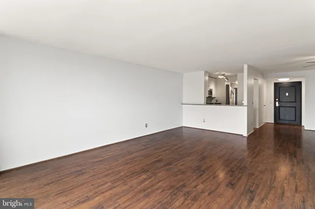 a view of a kitchen with wooden floor and floors