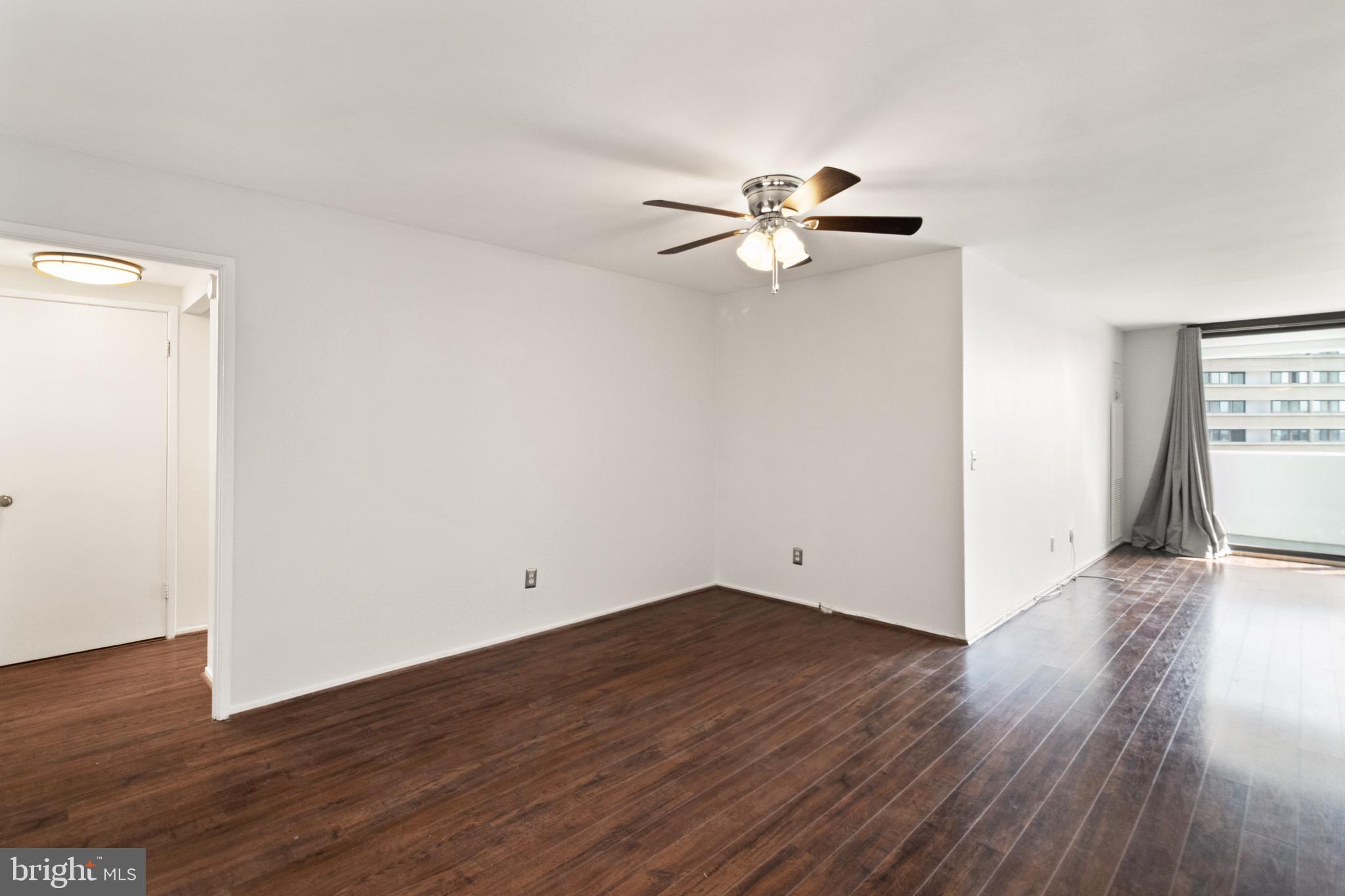 6101 Edsall Road, Unit 1209 Alexandria, VA 22304 - Photo 8 of 35 a view of empty room with wooden floor