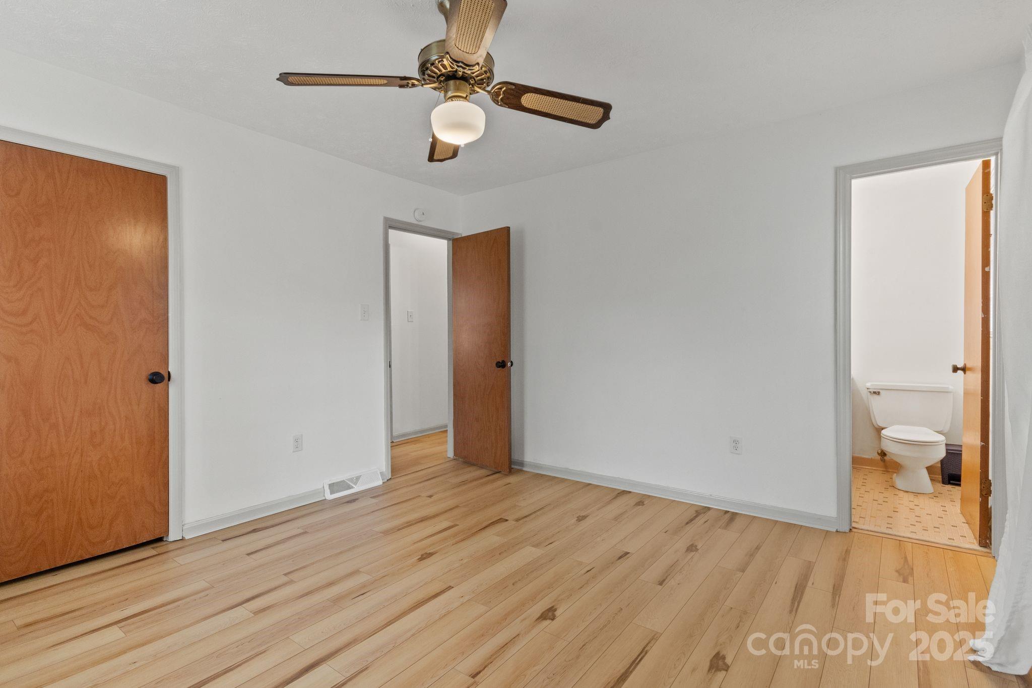 14 South Ridge Place Arden, NC 28704 - Photo 21 of 32 a view of empty room with wooden floor