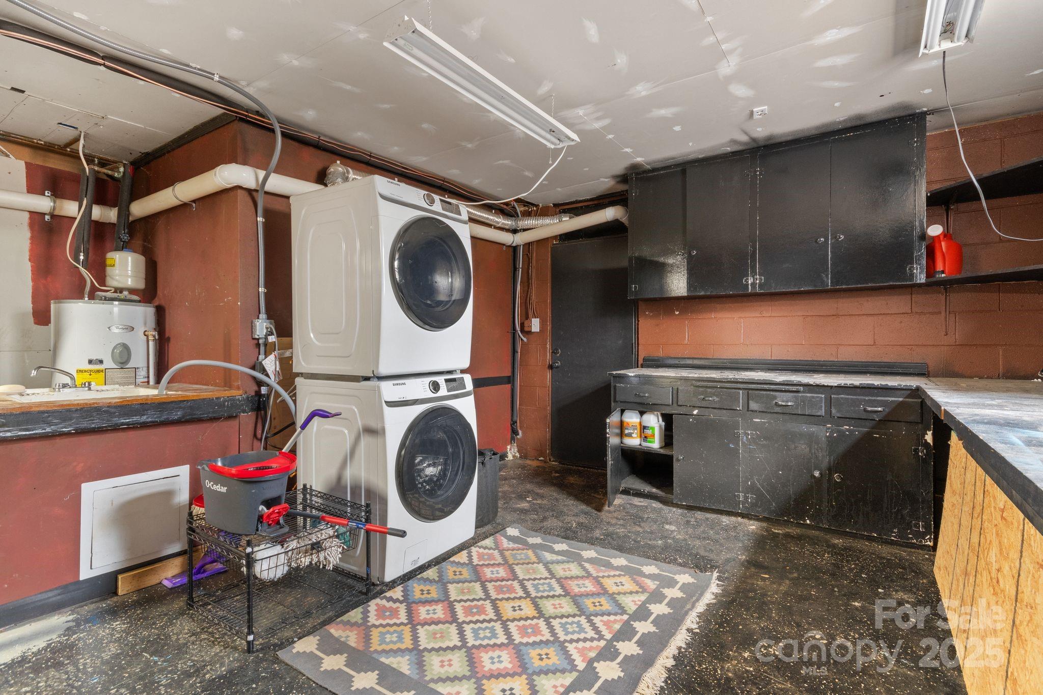 14 South Ridge Place Arden, NC 28704 - Photo 27 of 32 a utility room with dryer and washer