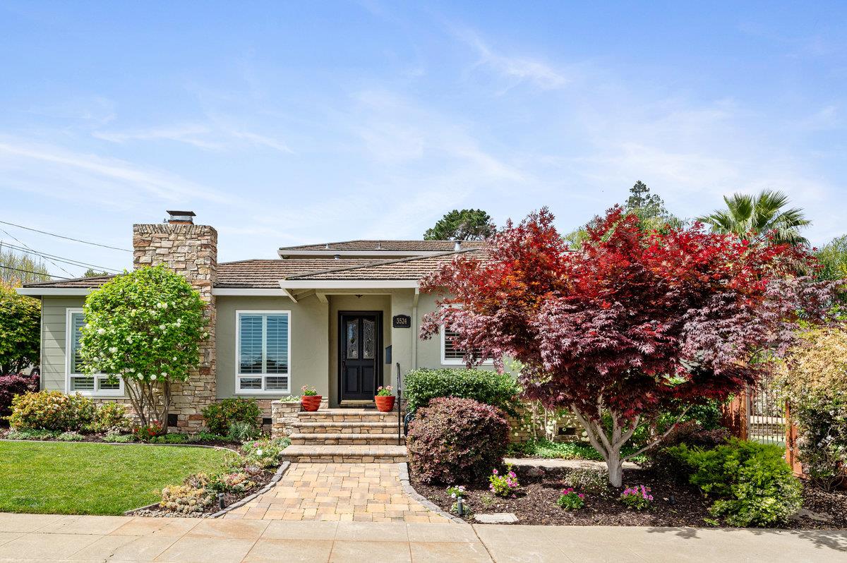 3524 Michael Drive San Mateo, CA 94403 - Photo 1 of 39 a front view of a house with a yard and a garden