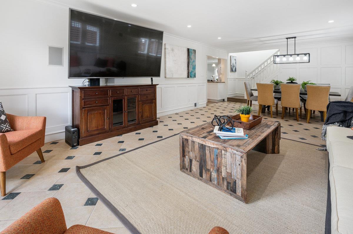 3524 Michael Drive San Mateo, CA 94403 - Photo 16 of 39 a kitchen with stainless steel appliances kitchen island granite countertop a stove a sink and a microwave