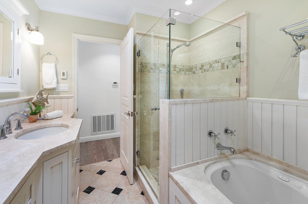 3524 Michael Drive San Mateo, CA 94403 - Photo 26 of 39 a bathroom with a tub sink and mirror