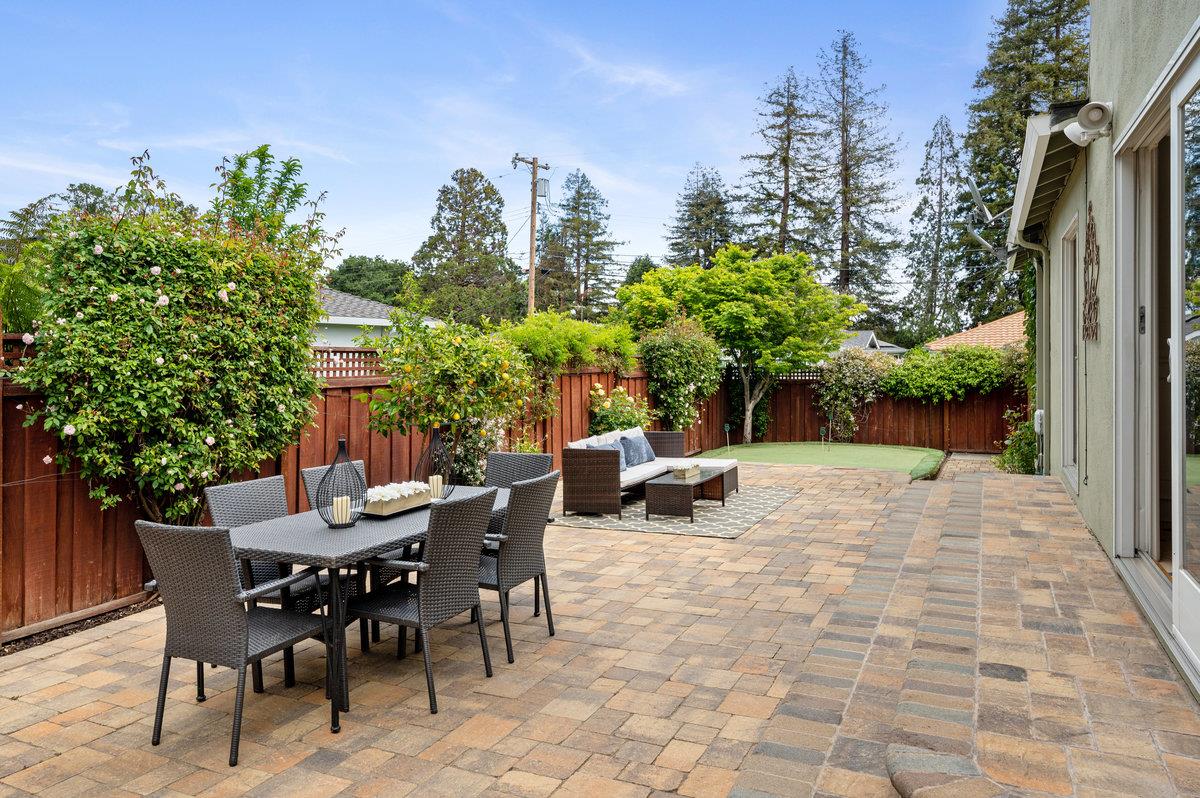 3524 Michael Drive San Mateo, CA 94403 - Photo 29 of 39 a view of a patio with a table and chairs