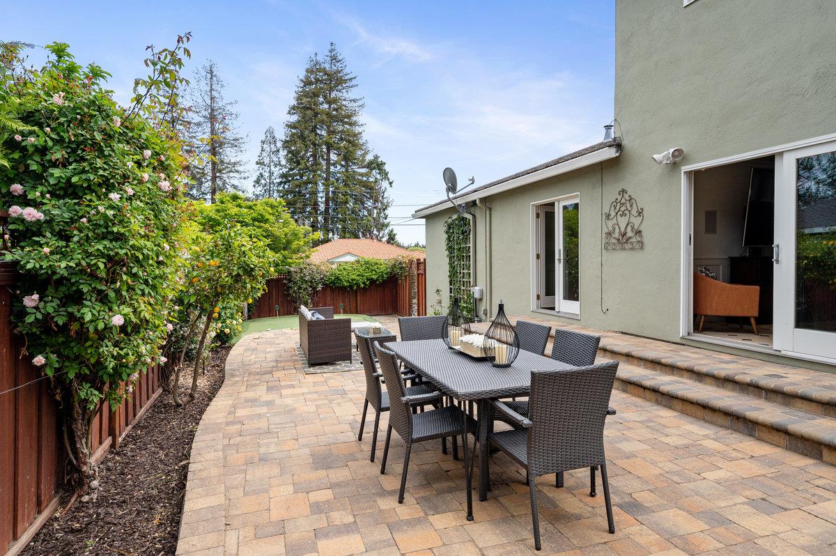 3524 Michael Drive San Mateo, CA 94403 - Photo 31 of 39 a view of a patio with table and chairs and potted plants