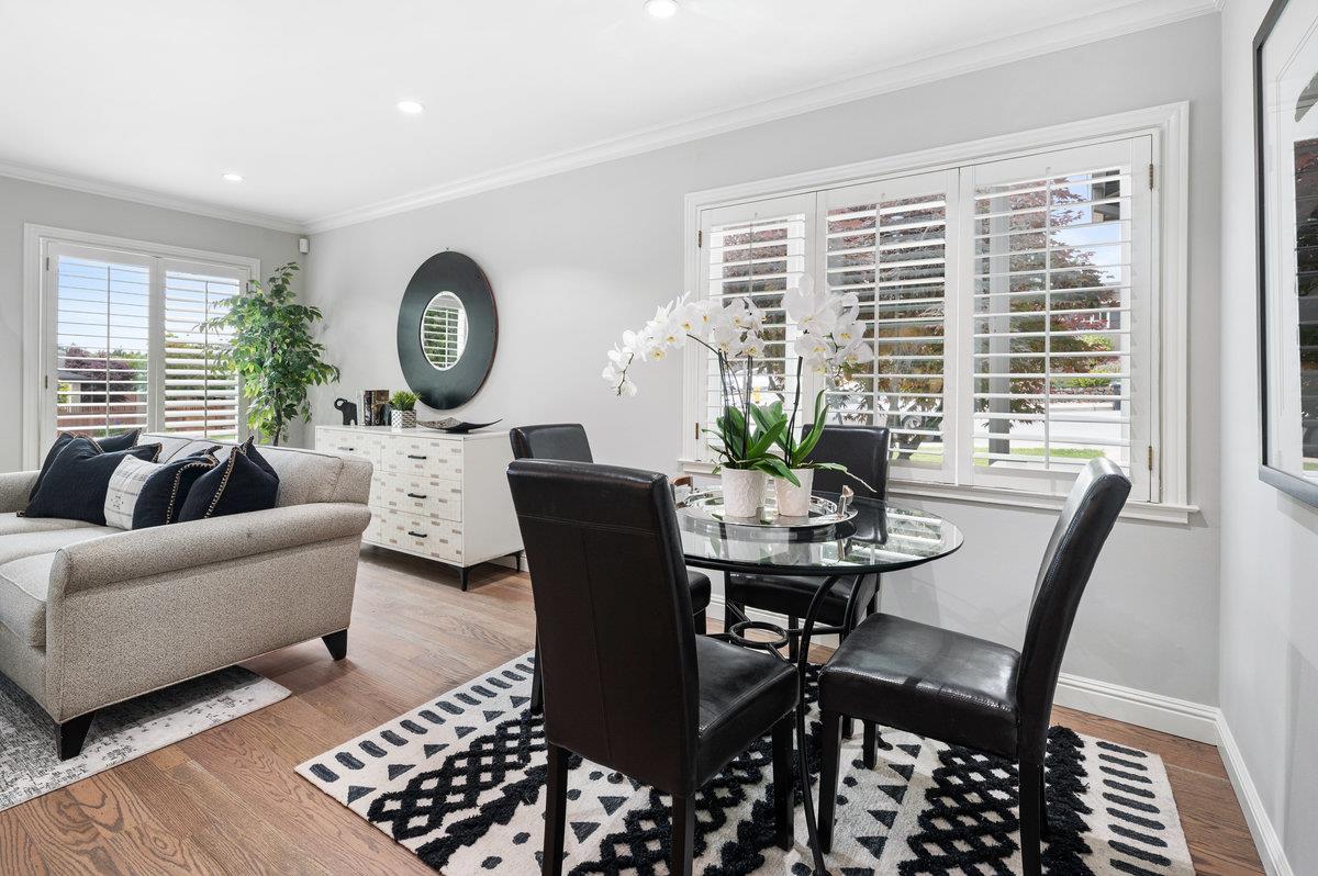 3524 Michael Drive San Mateo, CA 94403 - Photo 9 of 39 a living room with furniture a large window and a table