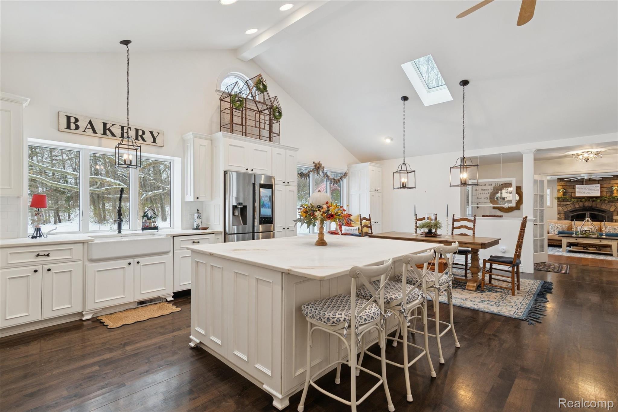 187 Darwin Road Pinckney, MI 48169 - Photo 17 of 71 Phenominal chefs kitchen with big work island, pendant lighting, and lots of natural light