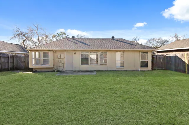 a view of a house with a garden