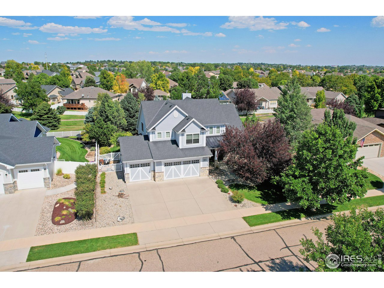 6801 West 34th St Road Greeley, CO 80634 - Photo 1 of 40 an aerial view of residential houses with outdoor space