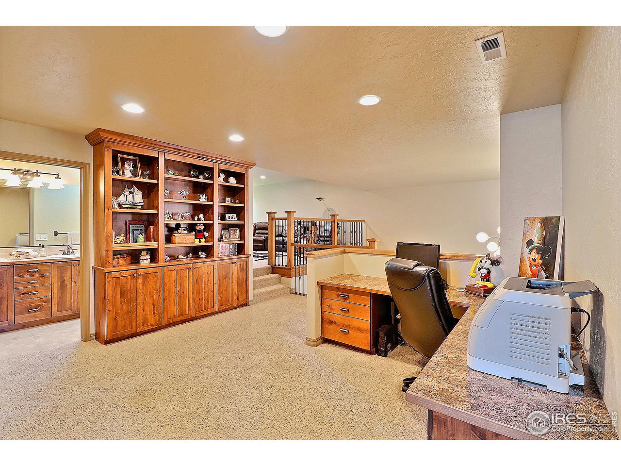 6801 West 34th St Road Greeley, CO 80634 - Photo 26 of 40 a living room with furniture and view of kitchen