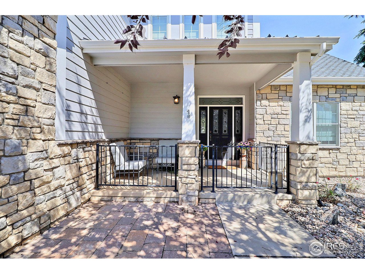 6801 West 34th St Road Greeley, CO 80634 - Photo 3 of 40 a view of a building with a bench in patio