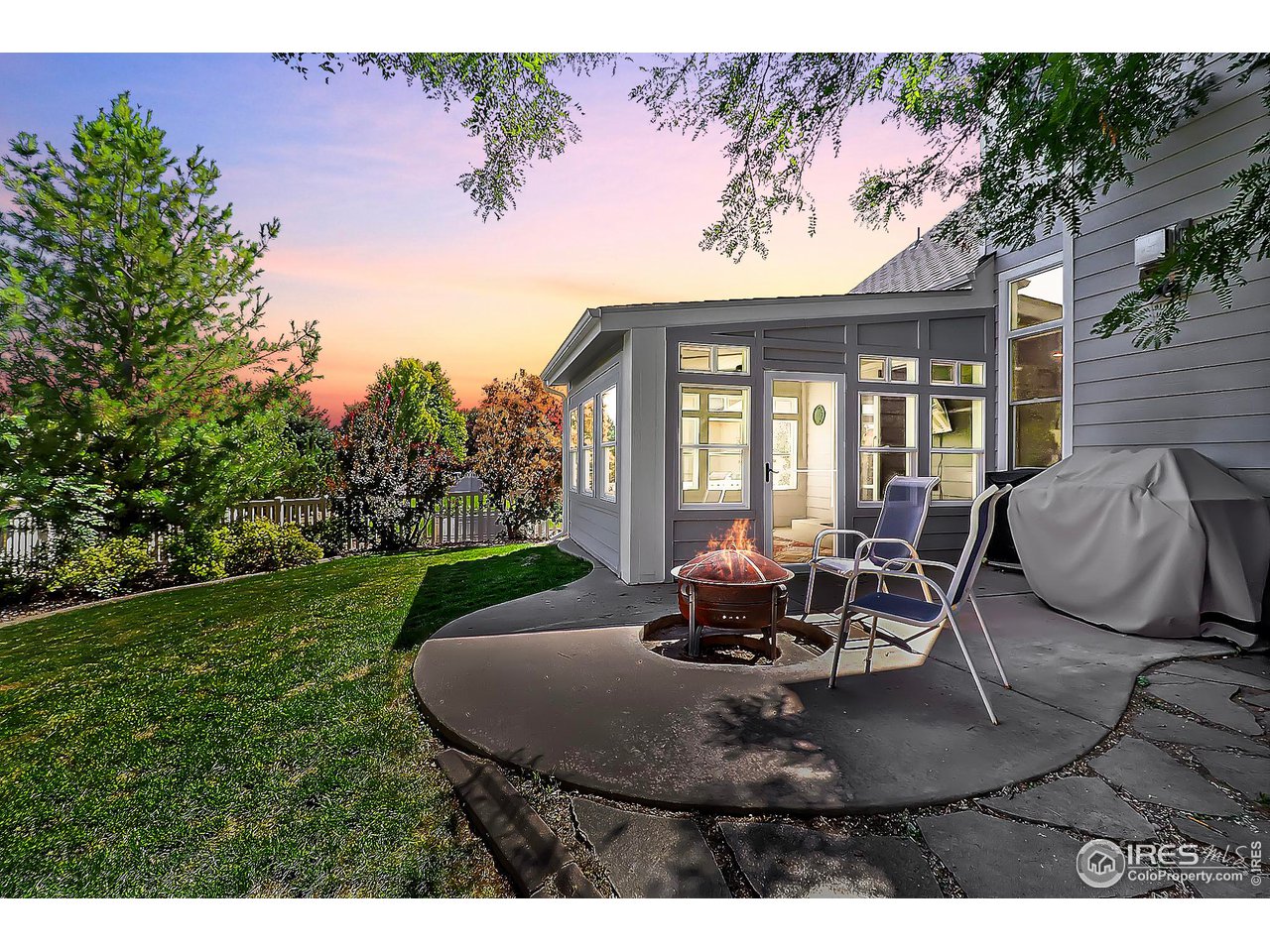 6801 West 34th St Road Greeley, CO 80634 - Photo 38 of 40 a view of a dining room with furniture and chandelier