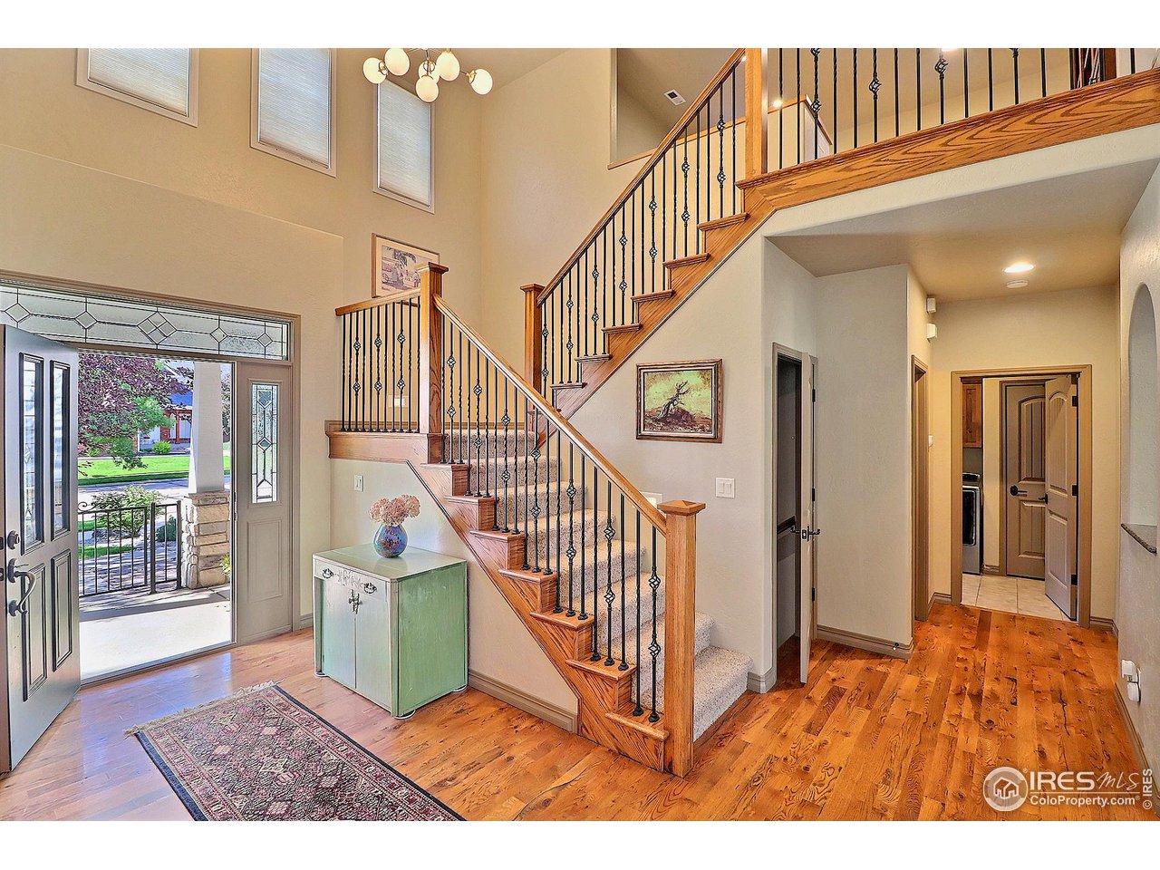 6801 West 34th St Road Greeley, CO 80634 - Photo 5 of 40 a view of entryway and hall with wooden floor