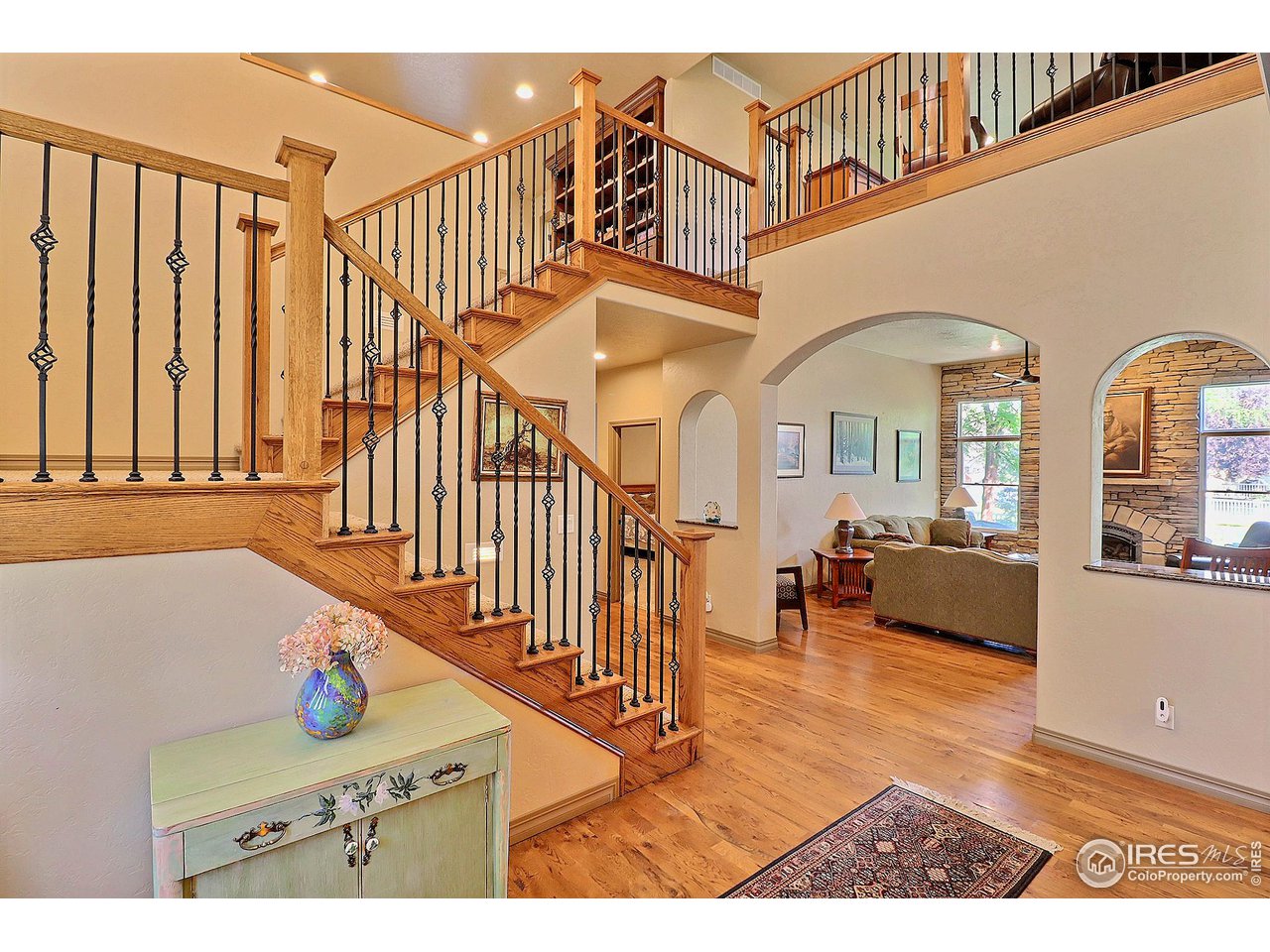 6801 West 34th St Road Greeley, CO 80634 - Photo 6 of 40 a view of entryway livingroom and hall