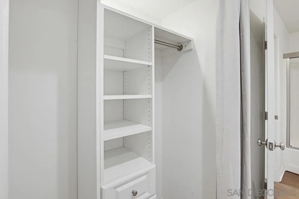 3643 Jetty Point Carlsbad, CA 92010 - Photo 24 of 37 a view of walk in closet with empty racks