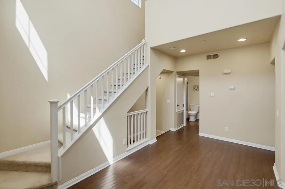3643 Jetty Point Carlsbad, CA 92010 - Photo 7 of 37 a view of entryway with wooden floor