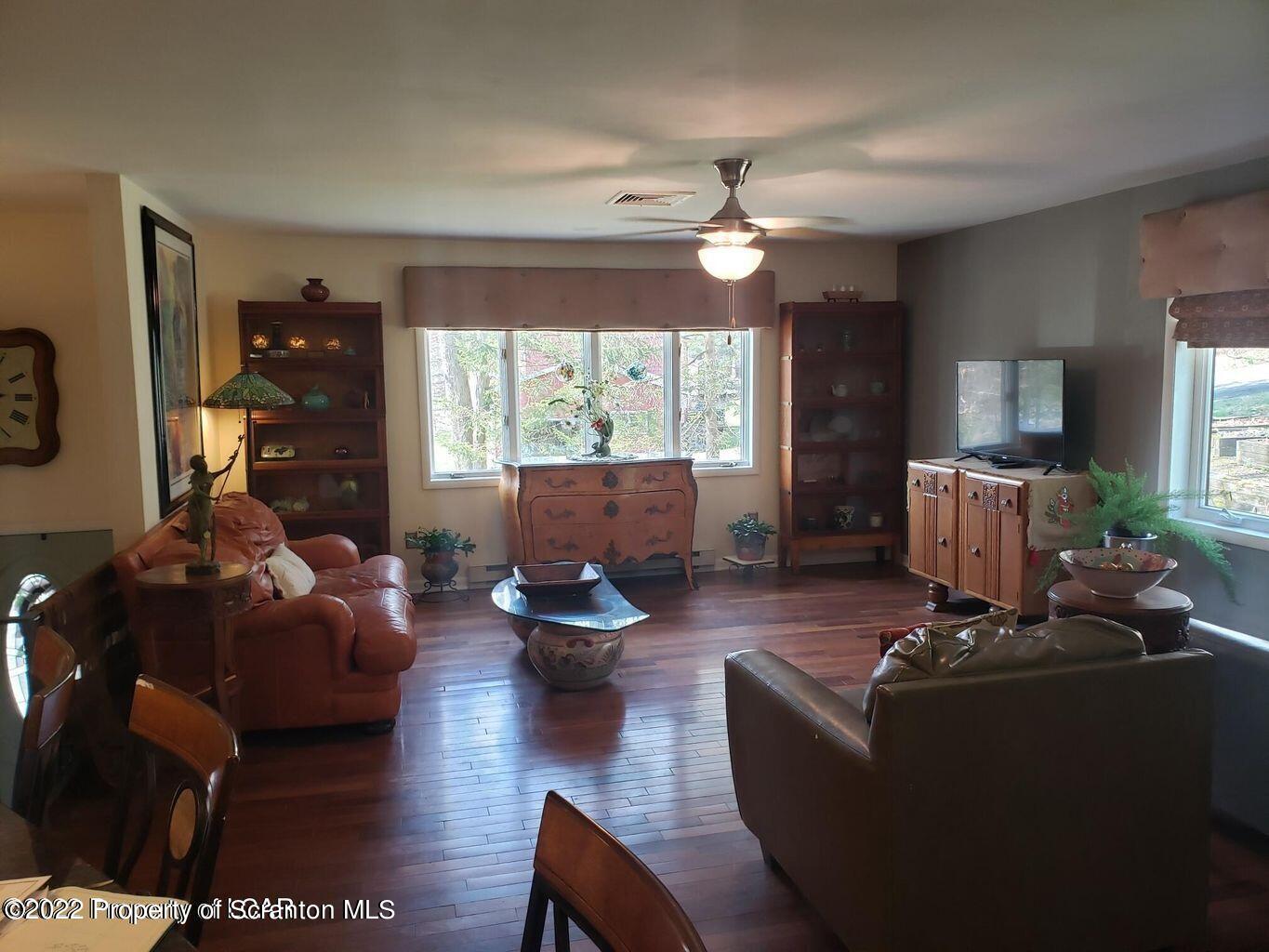 105 Collins Avenue Shavertown, PA 18708 - Photo 15 of 53 a living room with furniture and a large window