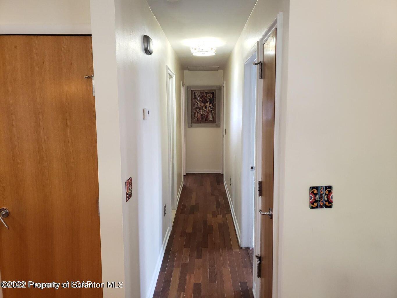 105 Collins Avenue Shavertown, PA 18708 - Photo 20 of 53 a view of a hallway with wooden floor
