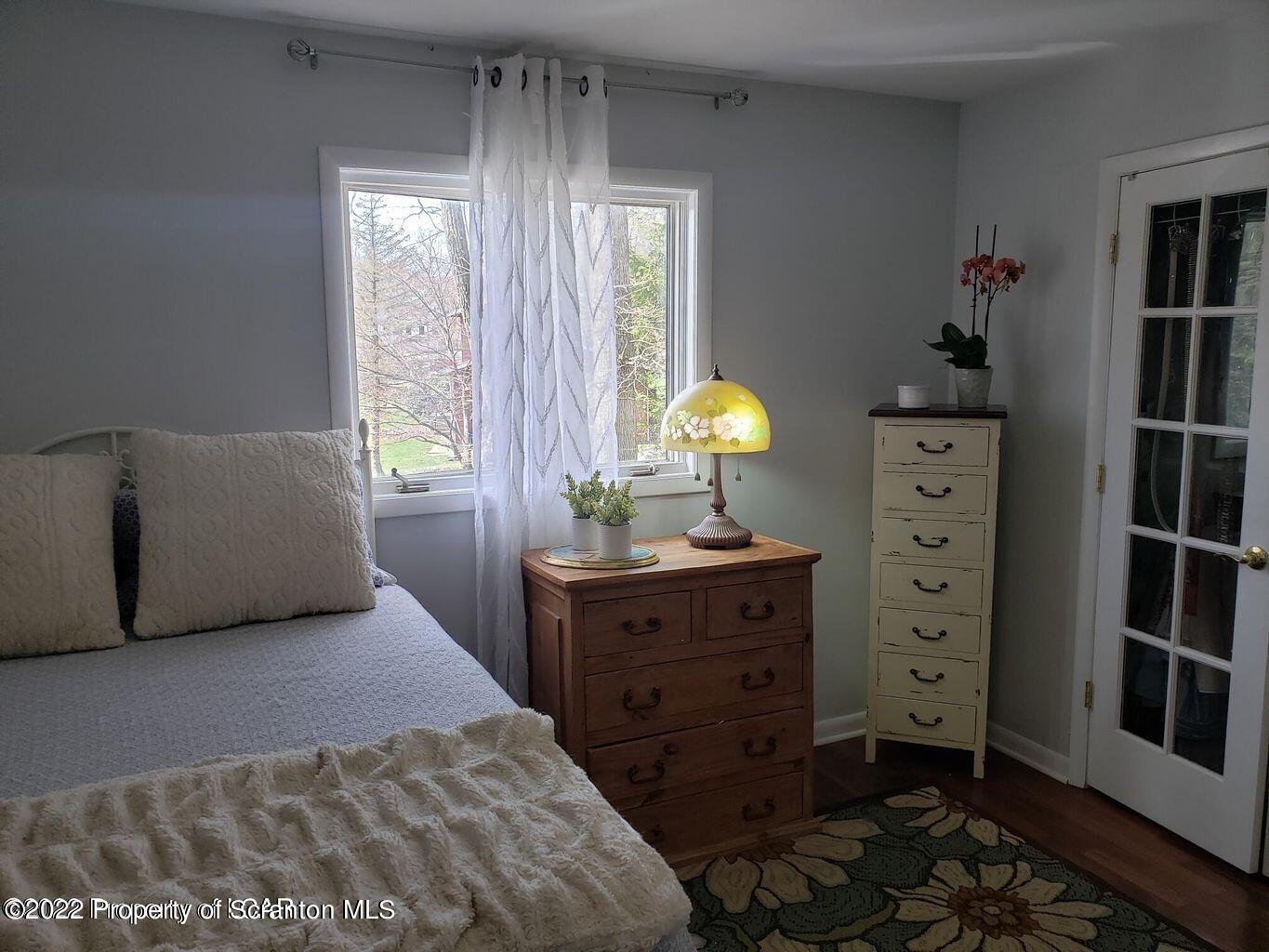 105 Collins Avenue Shavertown, PA 18708 - Photo 23 of 53 a bedroom with a bed and a window
