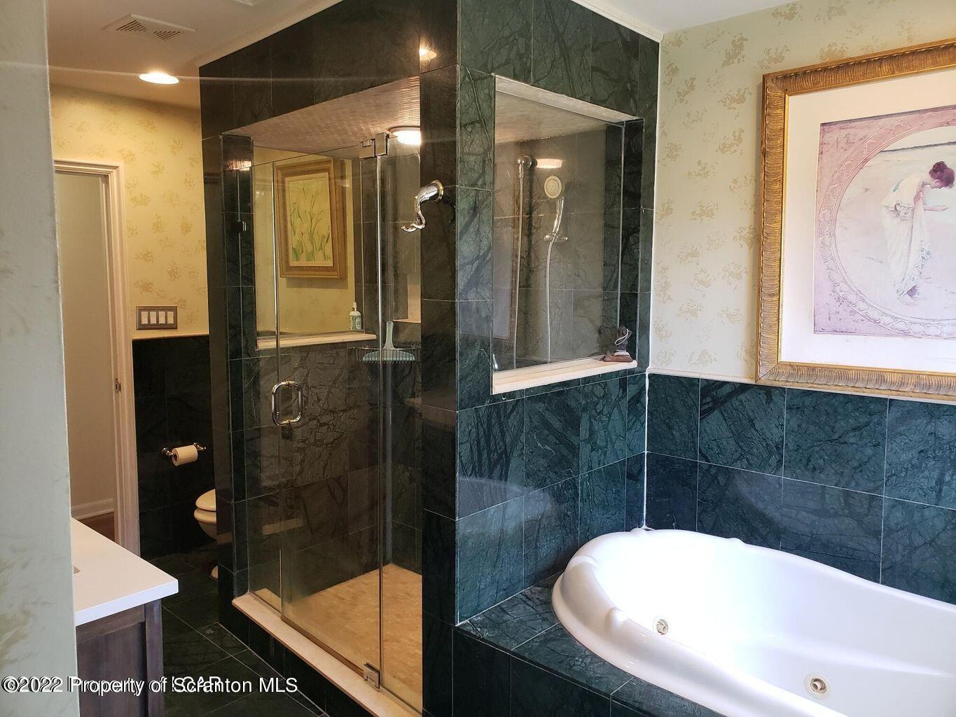 105 Collins Avenue Shavertown, PA 18708 - Photo 30 of 53 a bathroom with a tub and shower