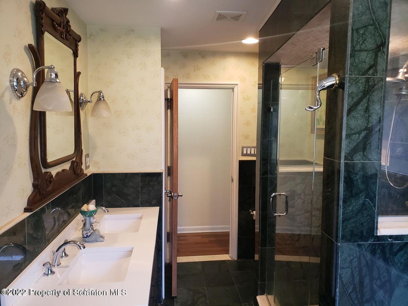 105 Collins Avenue Shavertown, PA 18708 - Photo 31 of 53 a bathroom with a bathtub and a shower