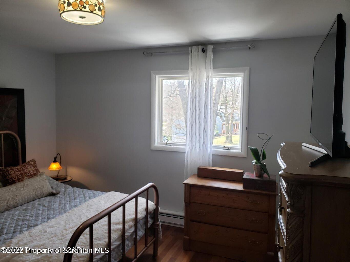 105 Collins Avenue Shavertown, PA 18708 - Photo 34 of 53 a bedroom with a bed and a window