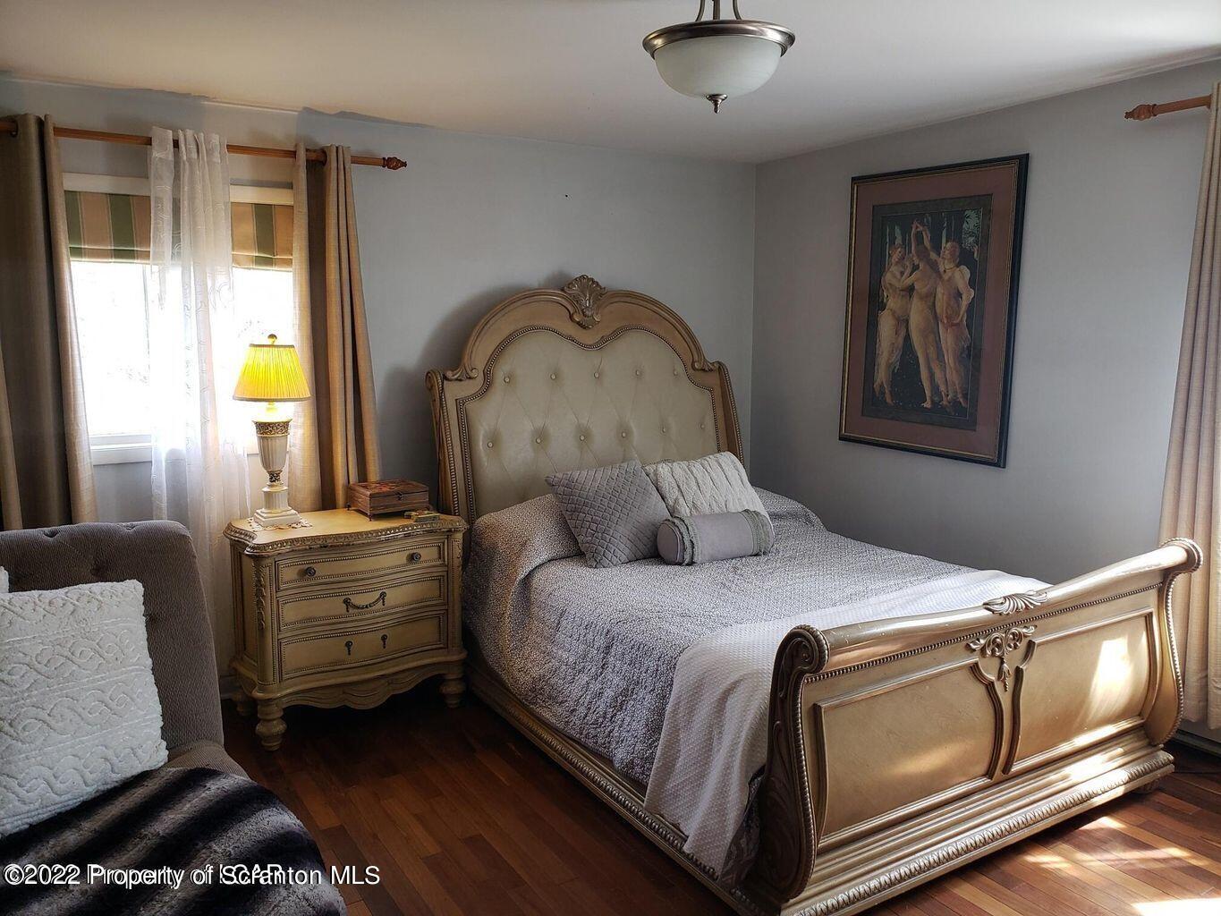 105 Collins Avenue Shavertown, PA 18708 - Photo 35 of 53 a bedroom with a bed and a dresser