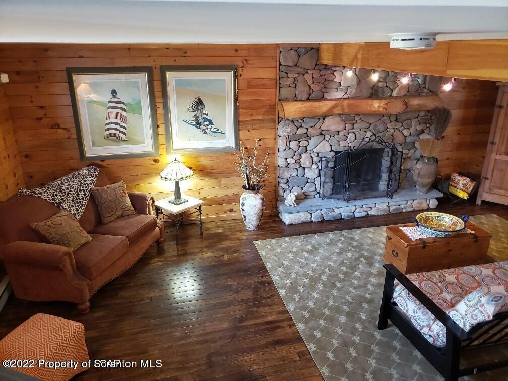 105 Collins Avenue Shavertown, PA 18708 - Photo 39 of 53 a living room with furniture and a fireplace