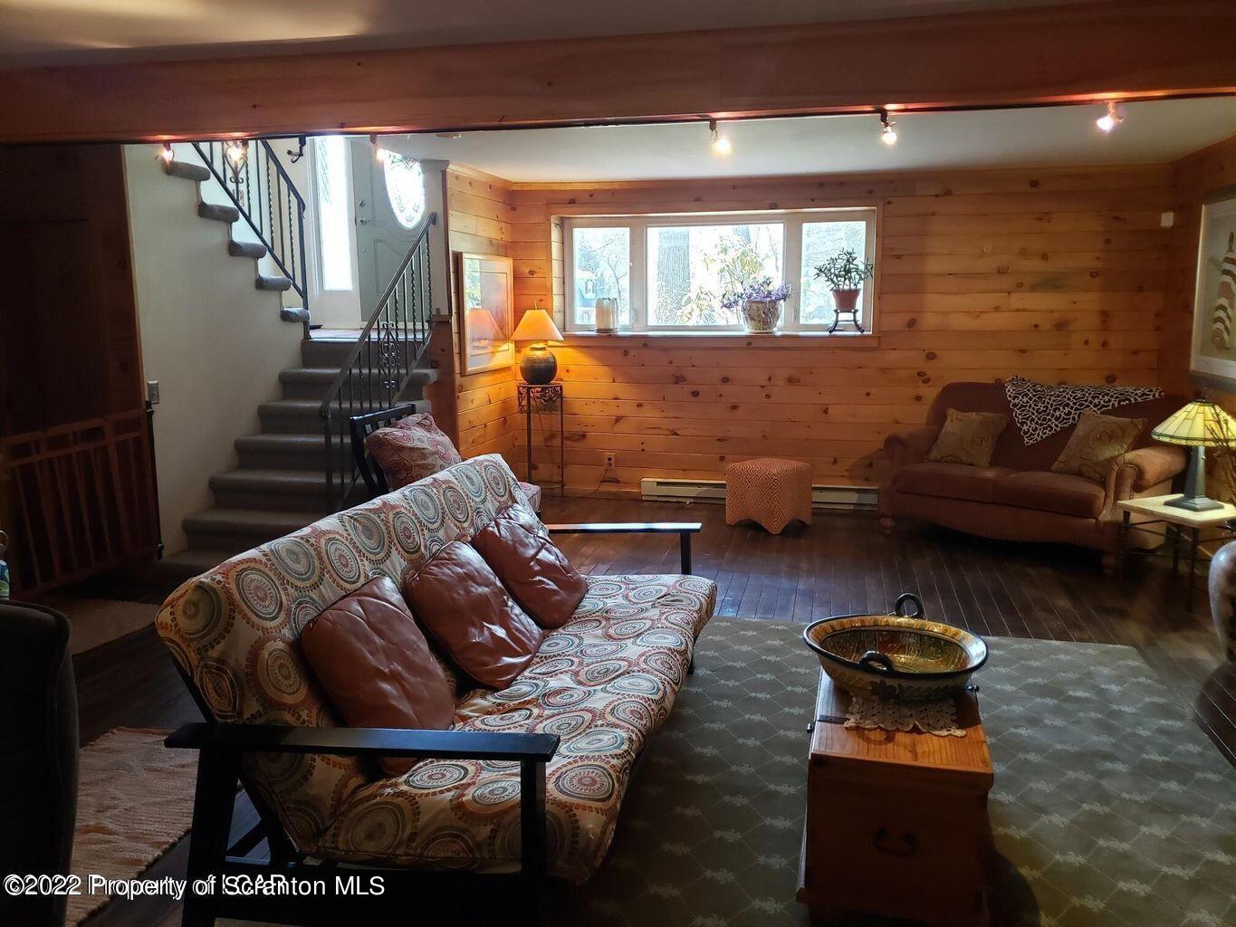 105 Collins Avenue Shavertown, PA 18708 - Photo 44 of 53 a living room with furniture and a large window