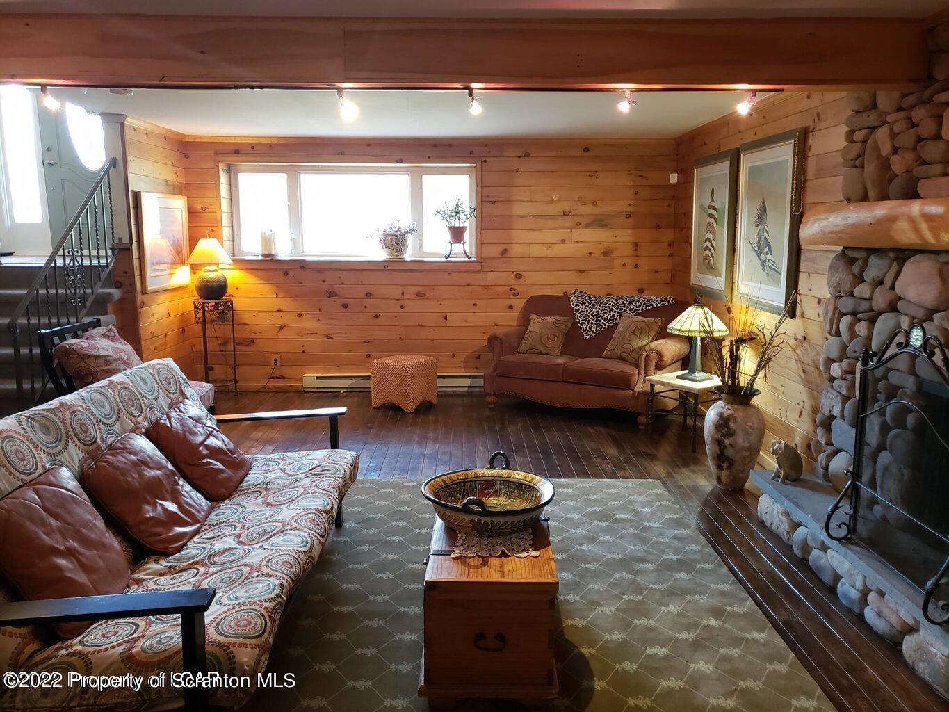 105 Collins Avenue Shavertown, PA 18708 - Photo 45 of 53 a living room with furniture and a fireplace
