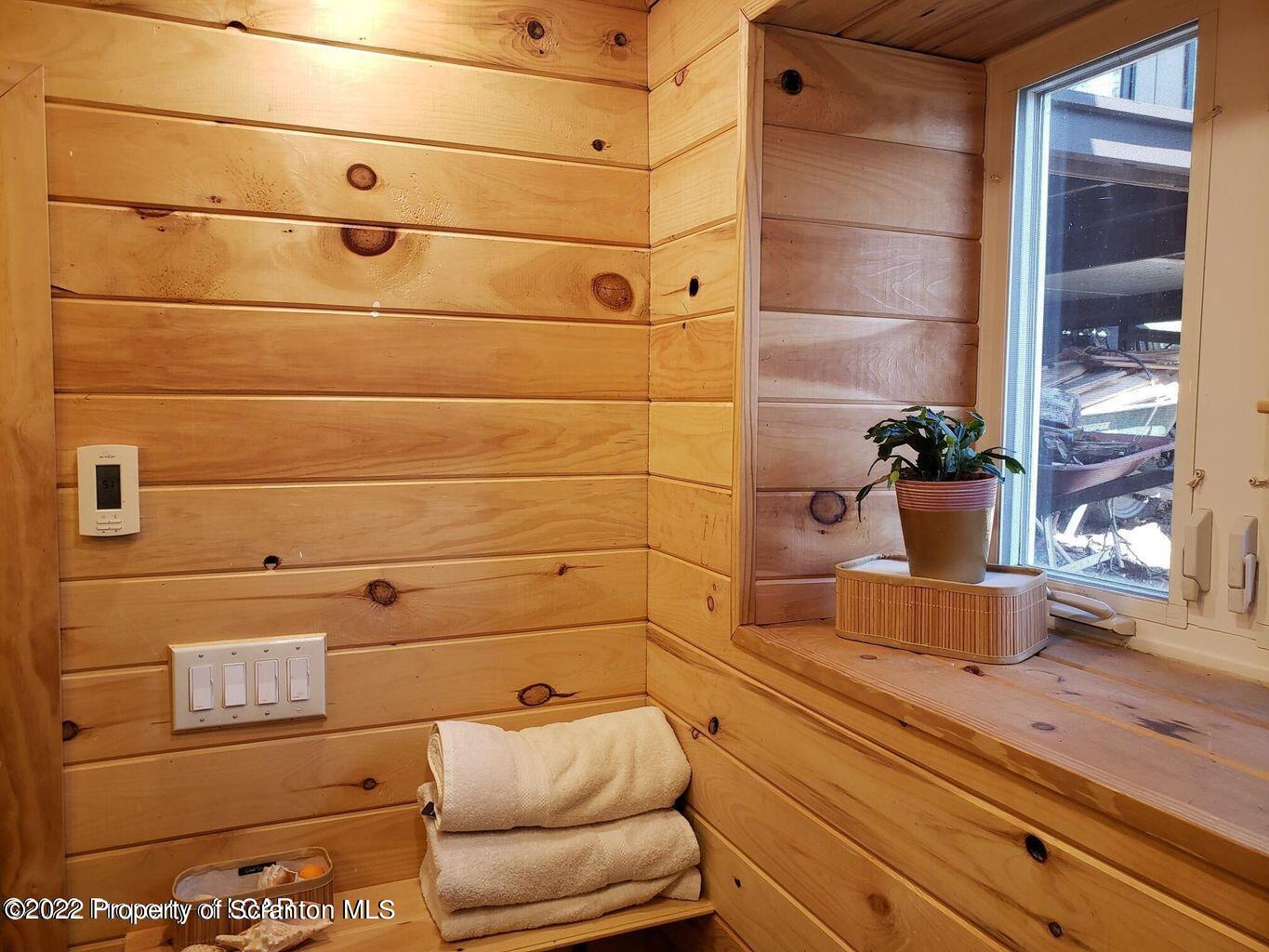 105 Collins Avenue Shavertown, PA 18708 - Photo 52 of 53 a bathroom with a sink and a mirror