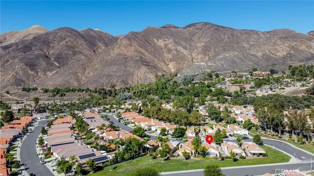 a view of mountains and valleys