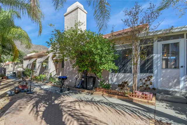 a view of a house with a street