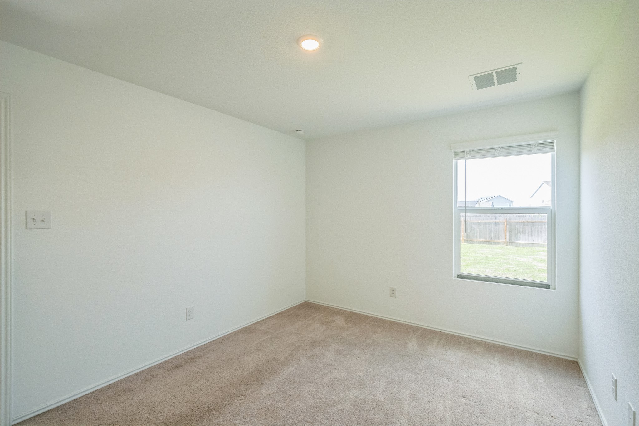 505 Sergeant Murphy Road Jarrell, TX 76537 - Photo 13 of 16 an empty room with a window