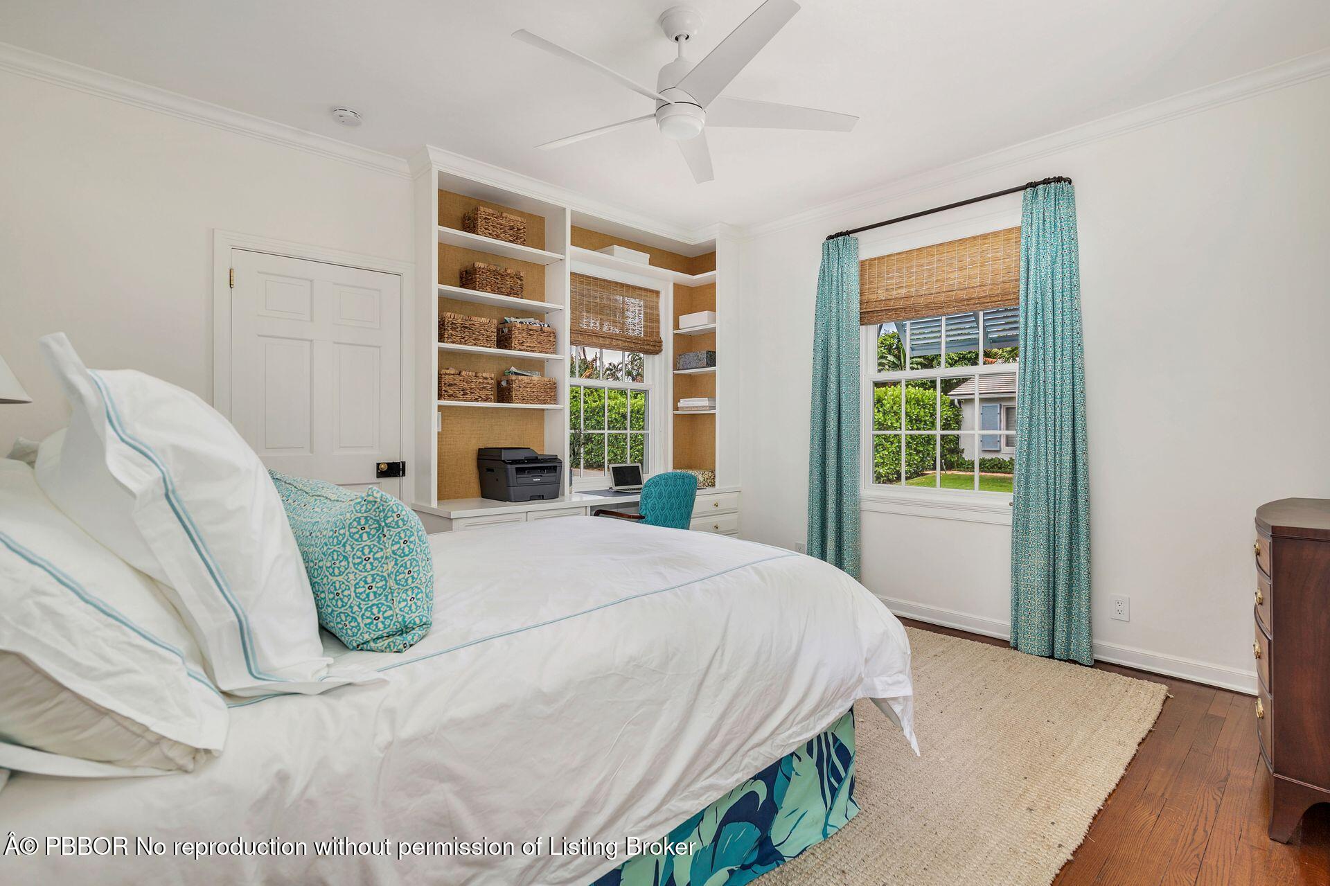 255 Colonial Lane Palm Beach, FL 33480 - Photo 12 of 32 a bedroom with a bed and a window