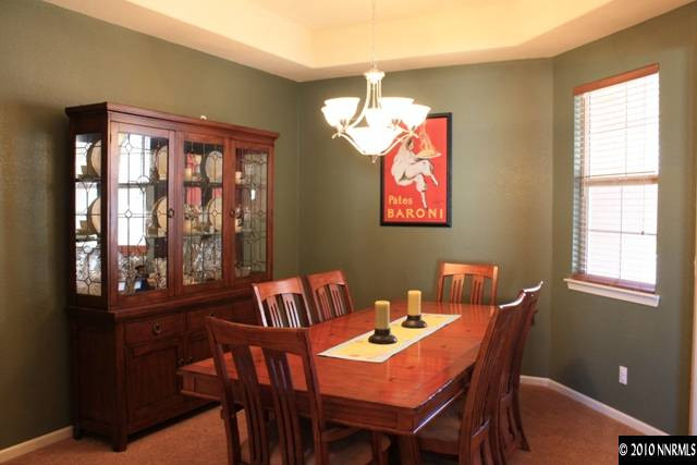 10611 Apple Mill Drive Reno, NV 89521 - Photo 2 of 9 a view of a dining room with furniture window and outside view