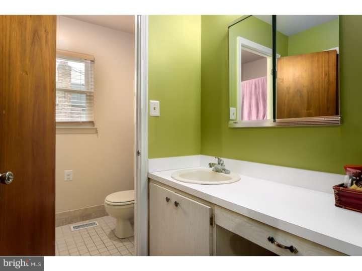10 Hanover Place Sicklerville, NJ 08081 - Photo 11 of 20 a bathroom with a sink a toilet and mirror