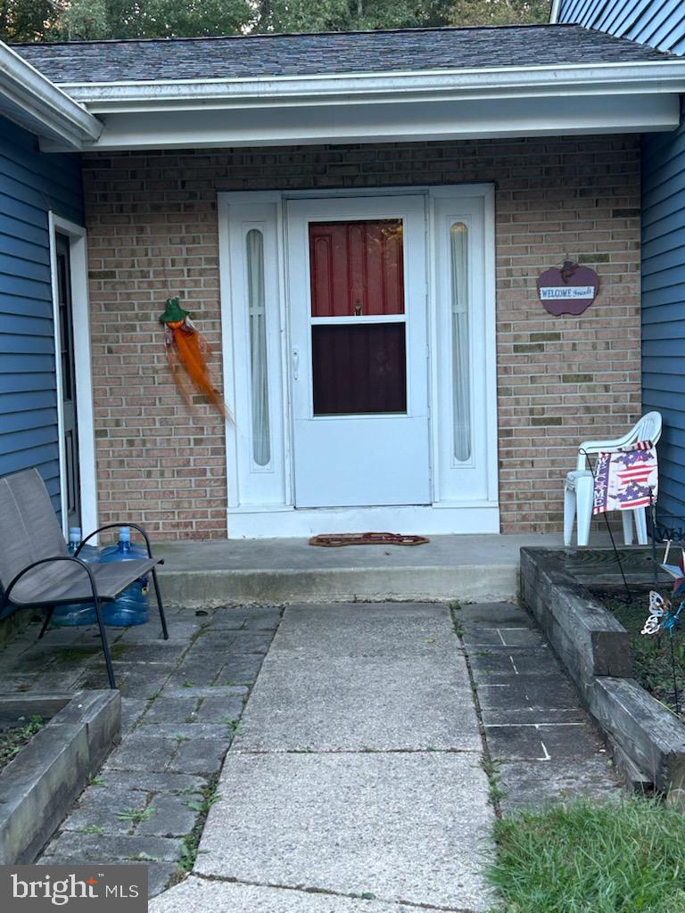 10 Hanover Place Sicklerville, NJ 08081 - Photo 19 of 20 a front view of a house with a yard