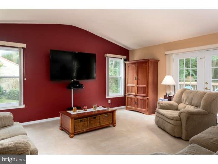 10 Hanover Place Sicklerville, NJ 08081 - Photo 2 of 20 a living room with furniture and a flat screen tv