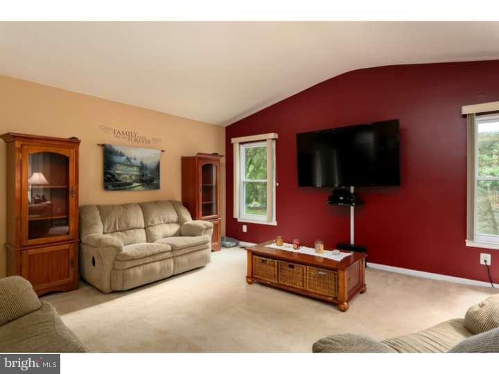 10 Hanover Place Sicklerville, NJ 08081 - Photo 3 of 20 a living room with furniture and a flat screen tv