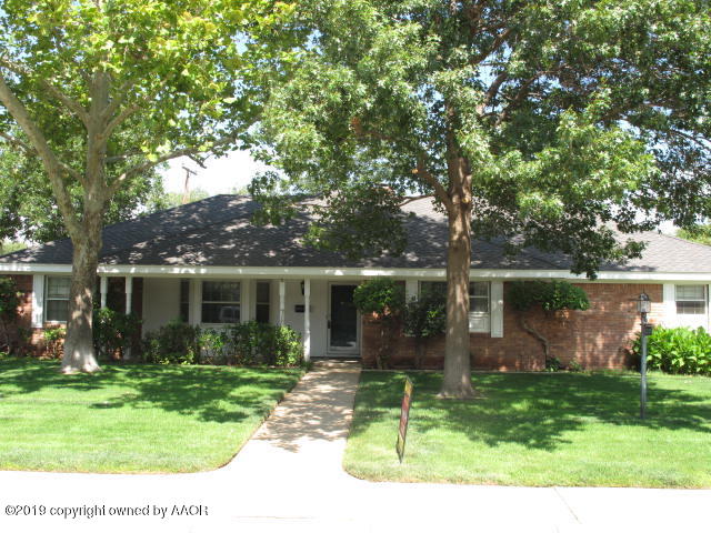 6206 Dreyfuss Road Amarillo, TX 79106 - Photo 1 of 15 a front view of house with a garden