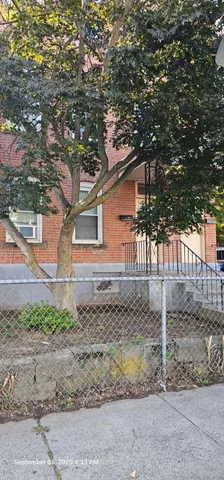 a house with trees in front of it