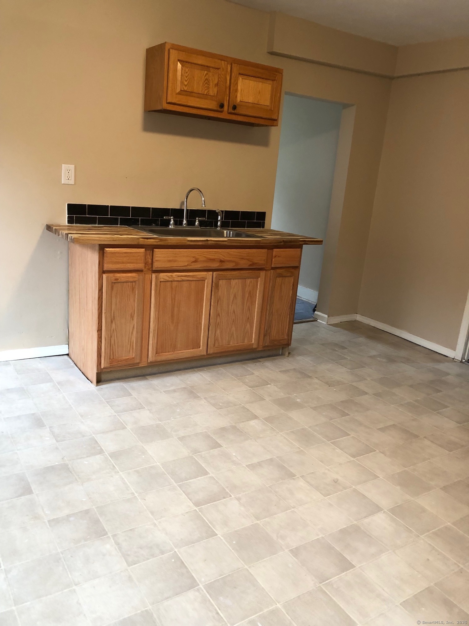 119 Glen Street, Unit 3 New Britain, CT 06051 - Photo 4 of 4 a view of a storage & utility room with a sink