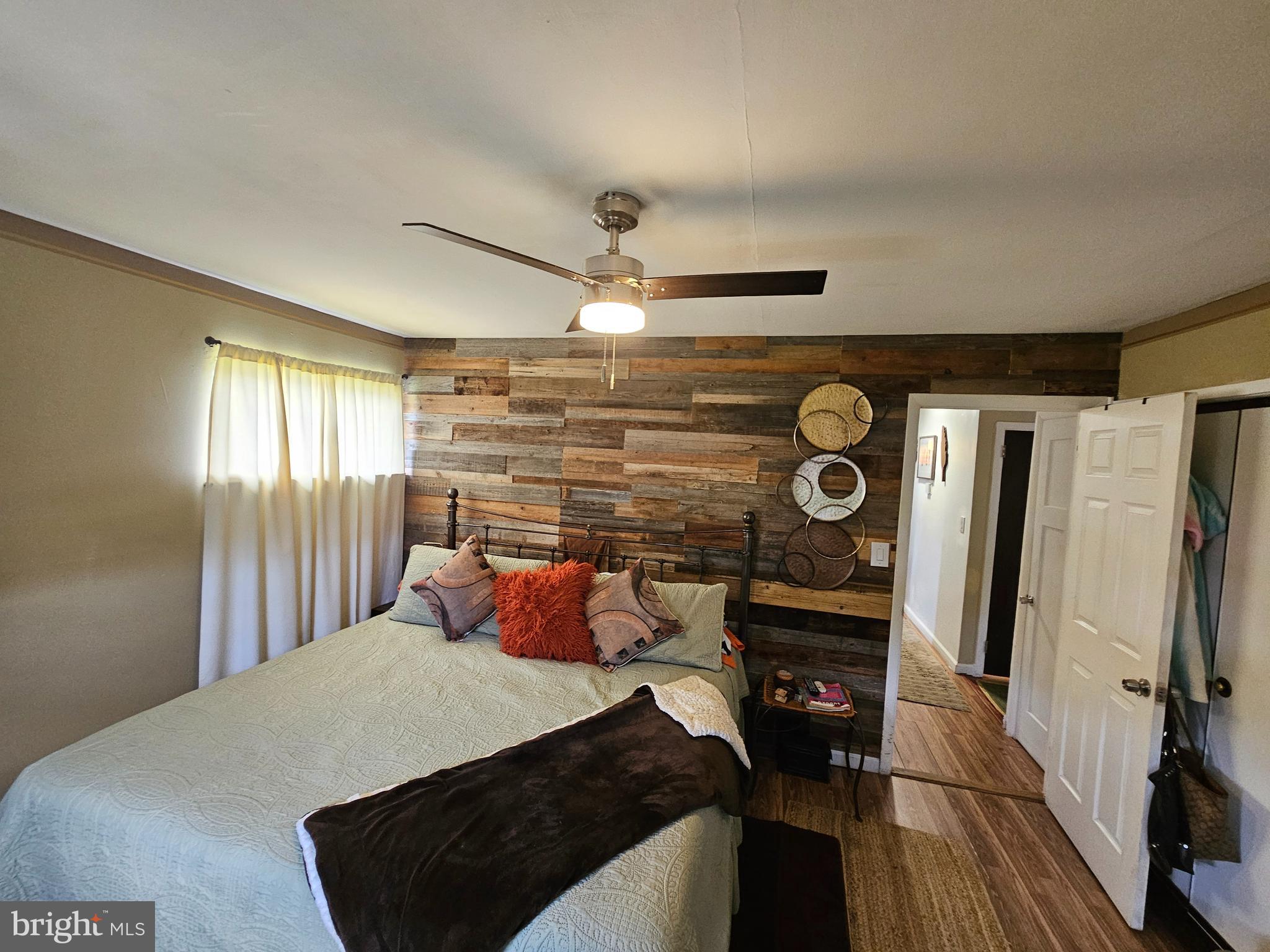 710 Smith Lane Mount Holly, NJ 08060 - Photo 16 of 26 a bedroom with a bed and a flat tv screen