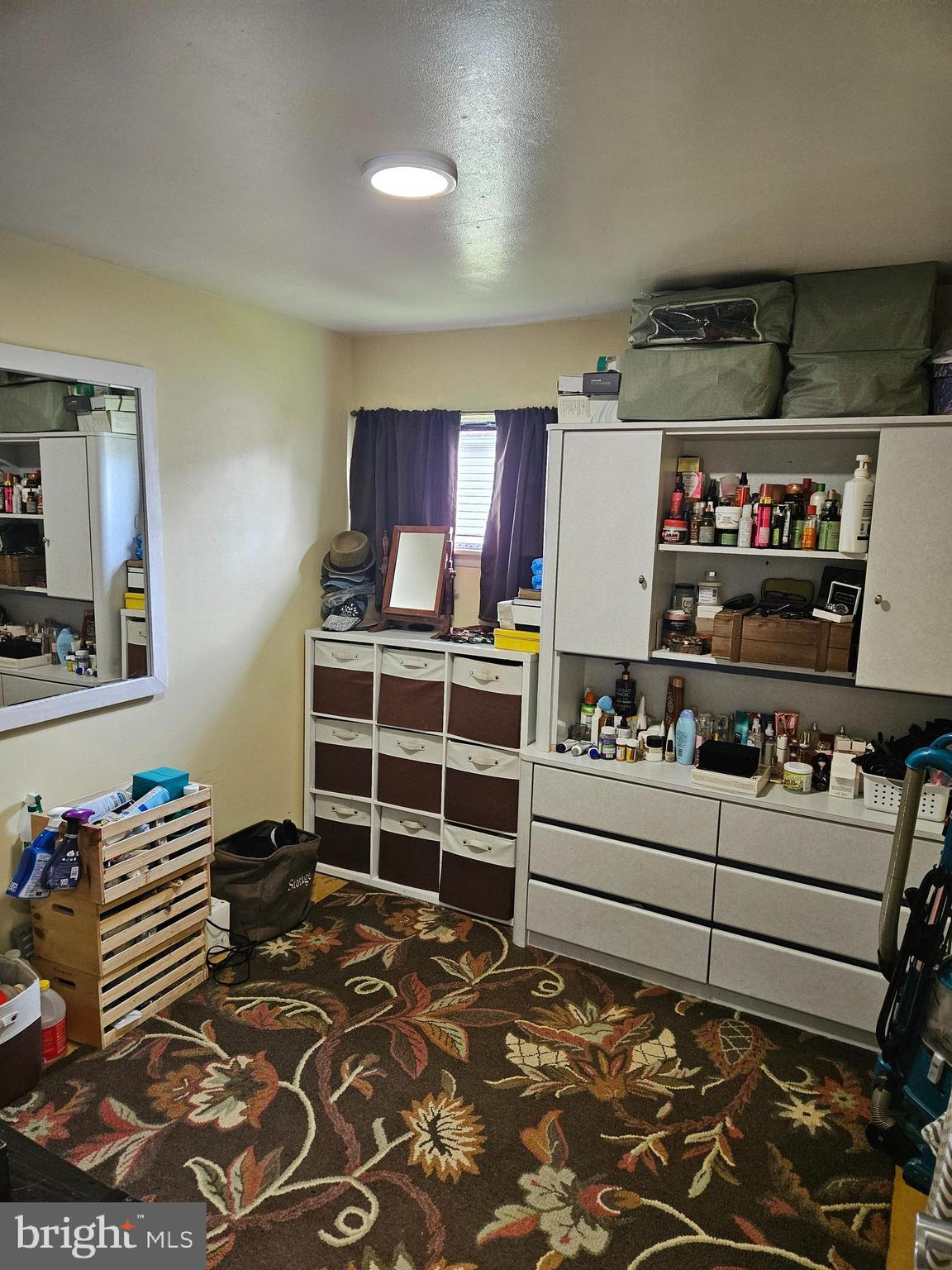 710 Smith Lane Mount Holly, NJ 08060 - Photo 18 of 26 a room with a walk in closet and a window