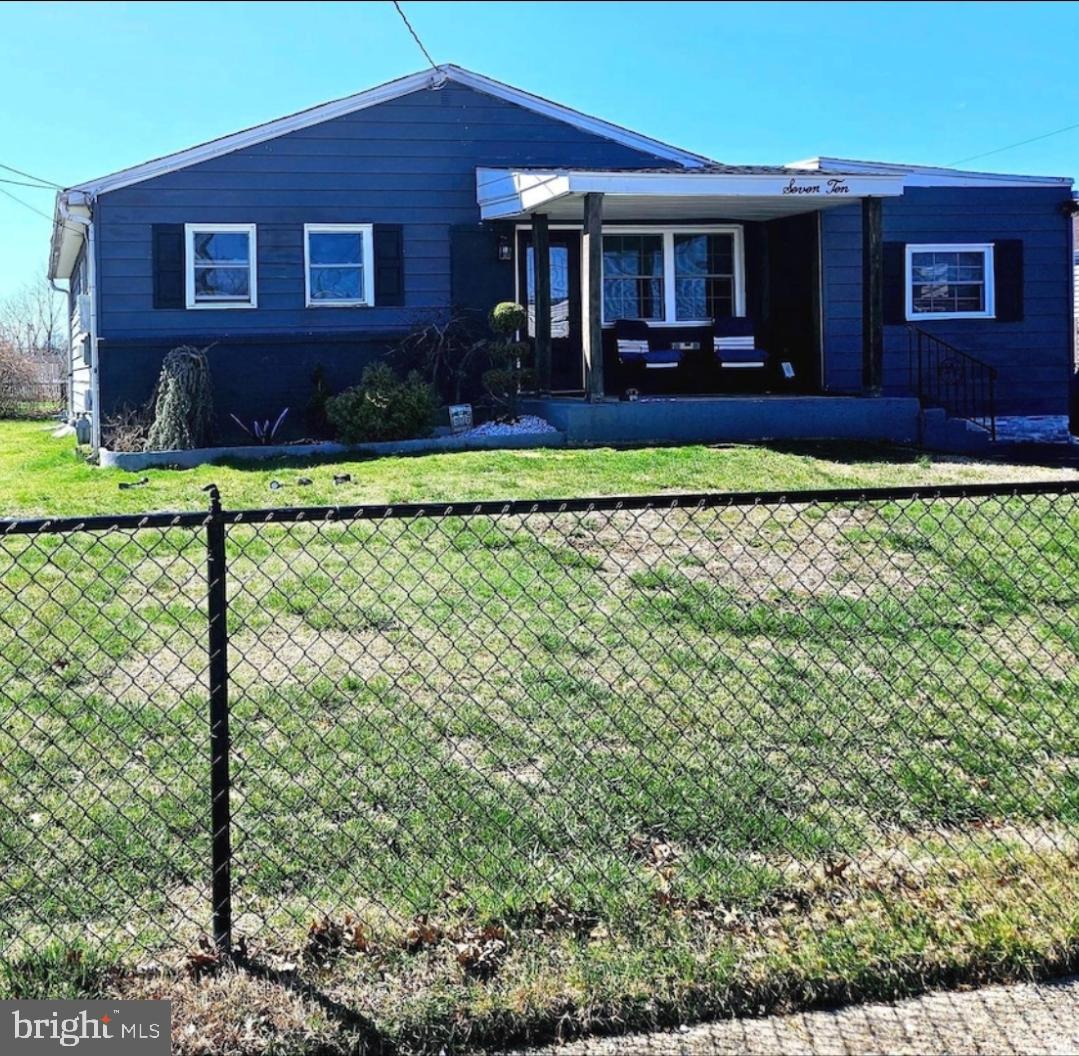 710 Smith Lane Mount Holly, NJ 08060 - Photo 2 of 26 front view of a house with a yard