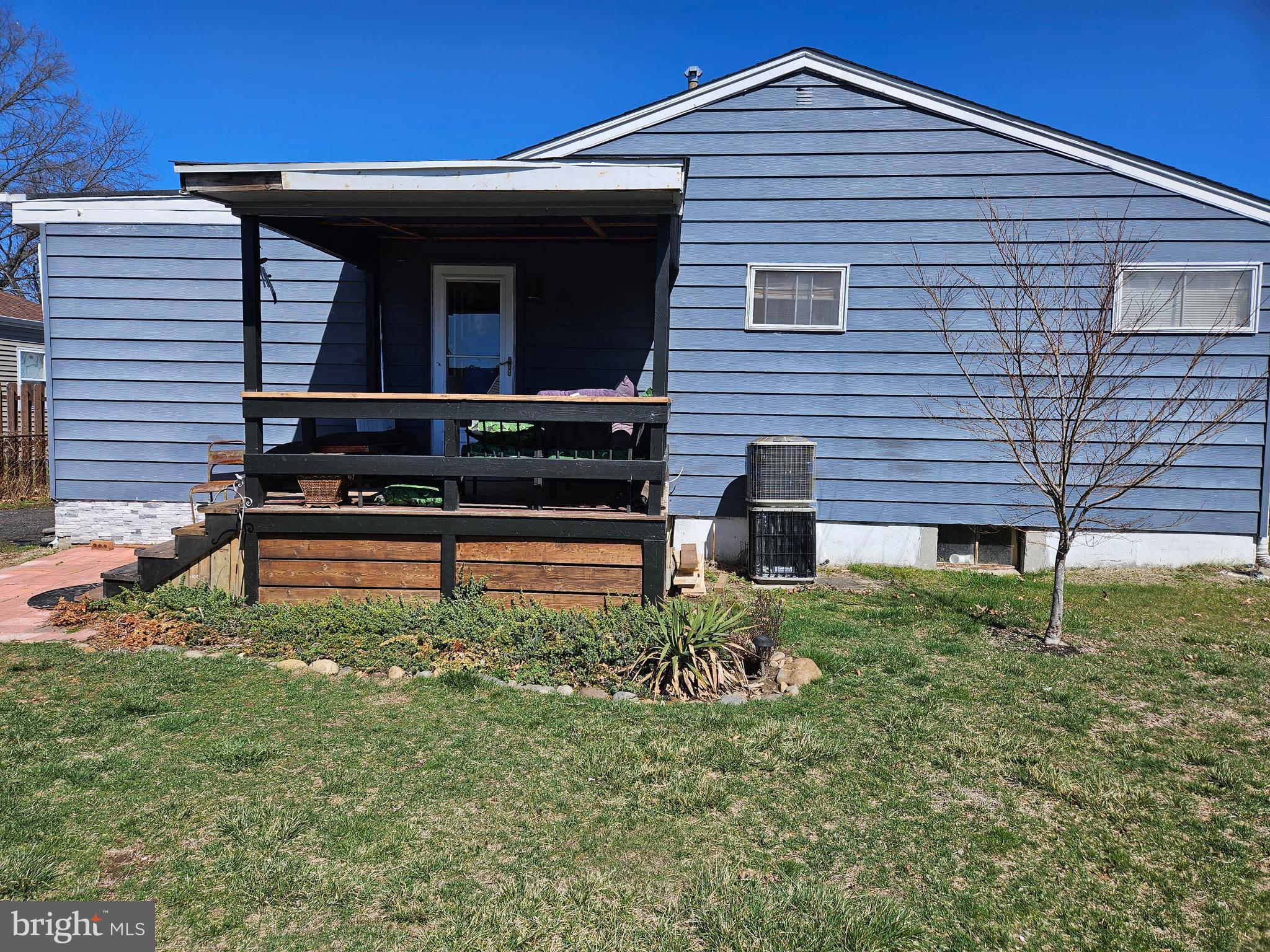 710 Smith Lane Mount Holly, NJ 08060 - Photo 25 of 26 a front view of a house with garden